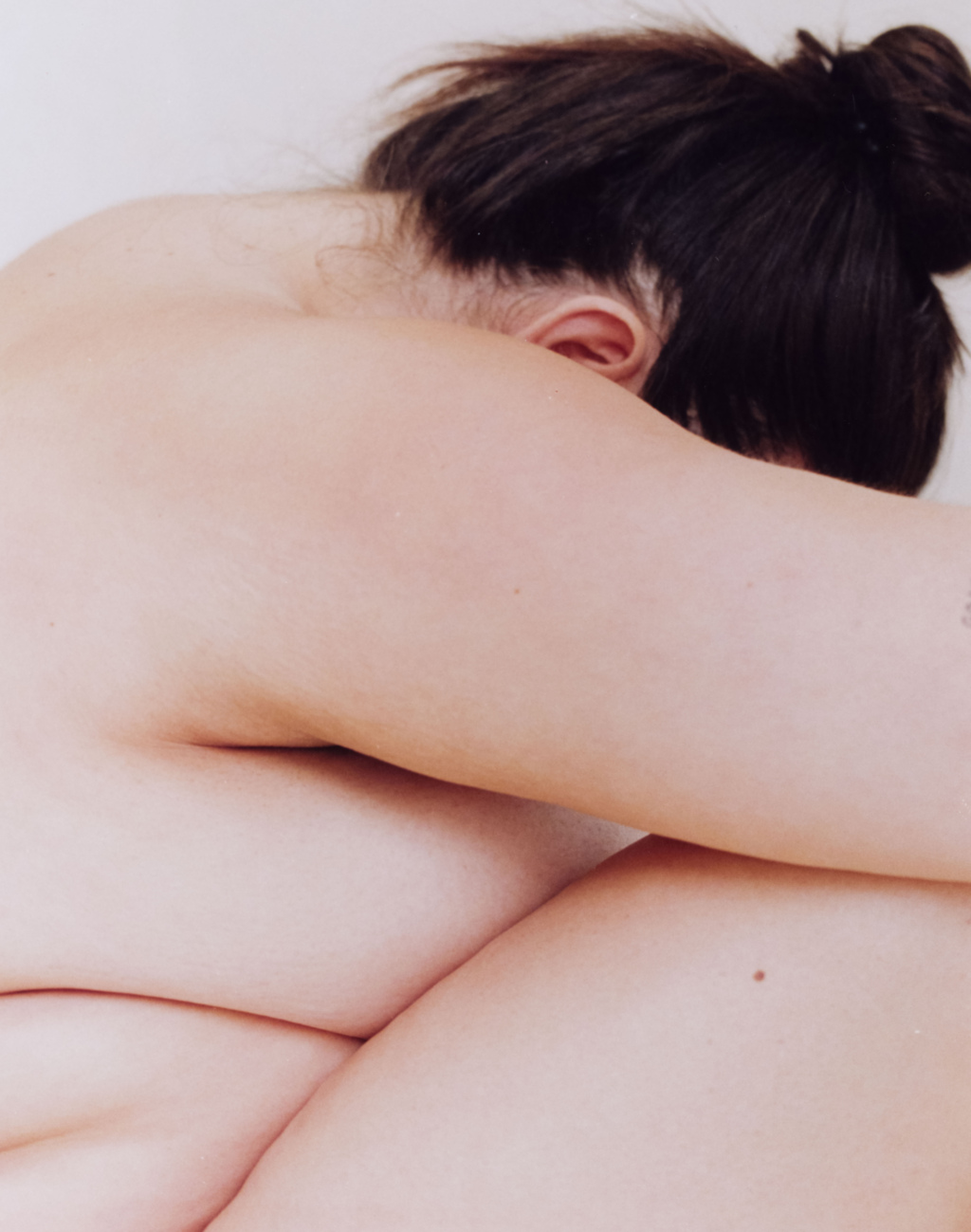 Detail of young woman's body