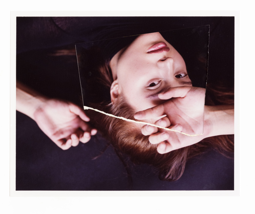 Print of a woman with print detail of her face superimposed